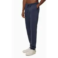 Calça Moletom Masculina Com Bolsos Logo Detalhe Calvin Klein Jeans - Azul Marinho Calça Moletom Masculina Com Bolsos Logo Detalhe Calvin Klein Jeans Azul Marinho p