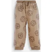 calça infantil de plush leão bege