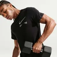 Camiseta Dri-FIT Nike Athletics Masculina - 1